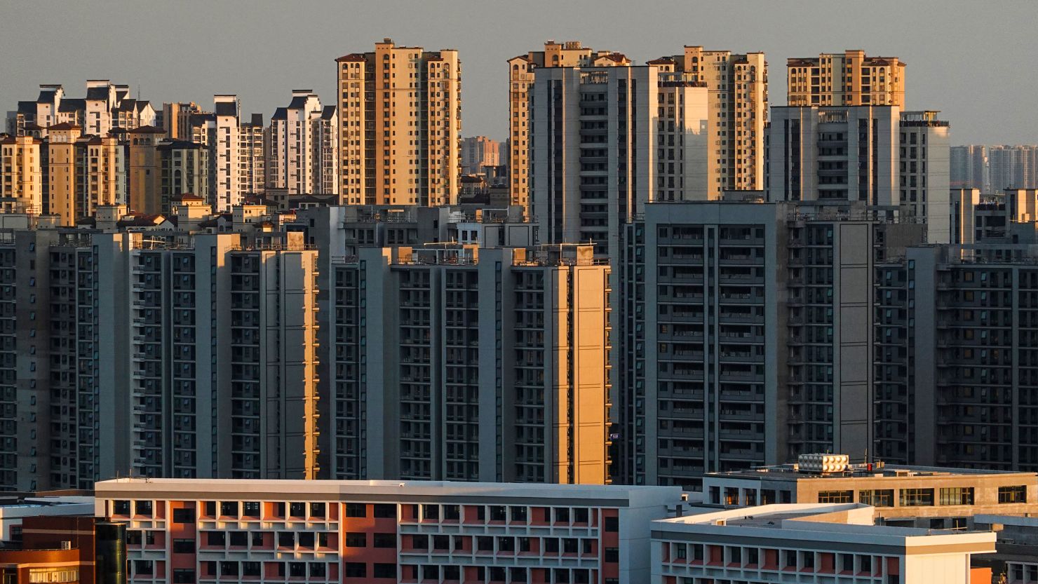 Residential high-rise towers in China illustrating the ongoing property sector crisis affecting global luxury markets
