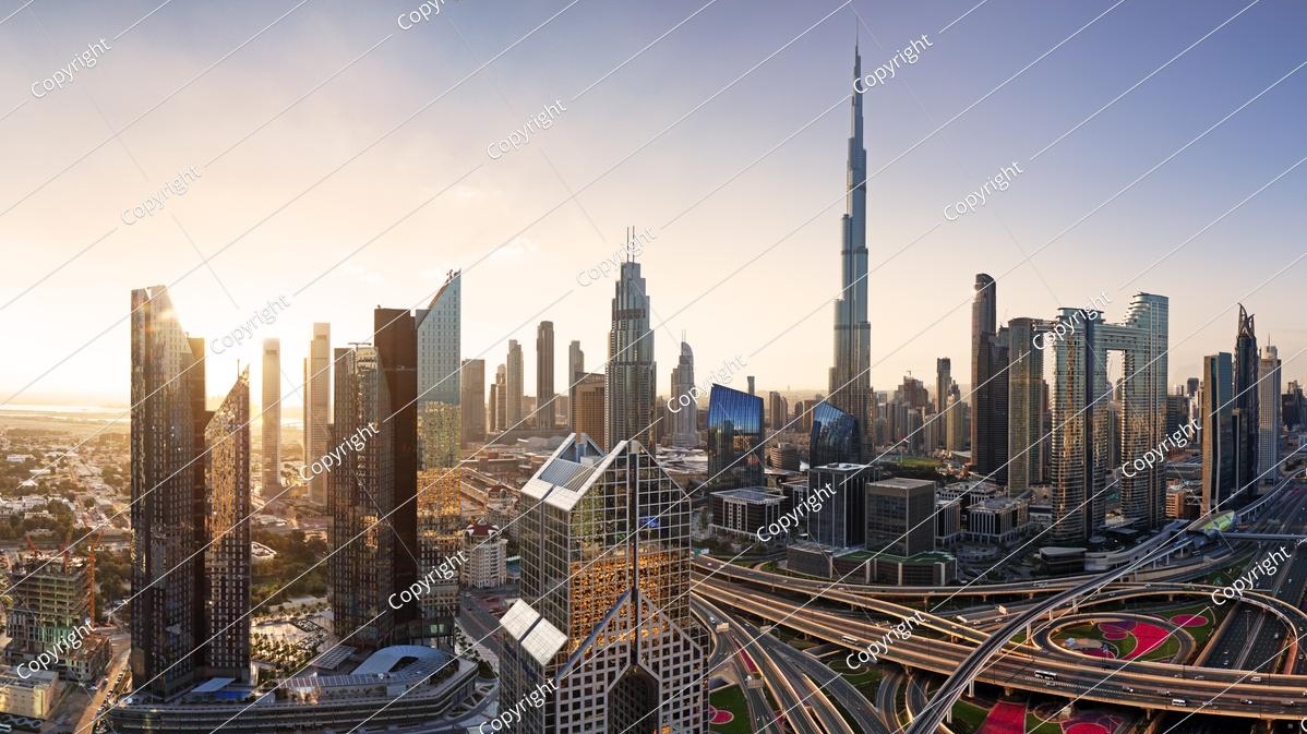 Dubai skyline at sunrise featuring Burj Khalifa and luxury residential towers amid discussions of a potential luxury real estate bubble